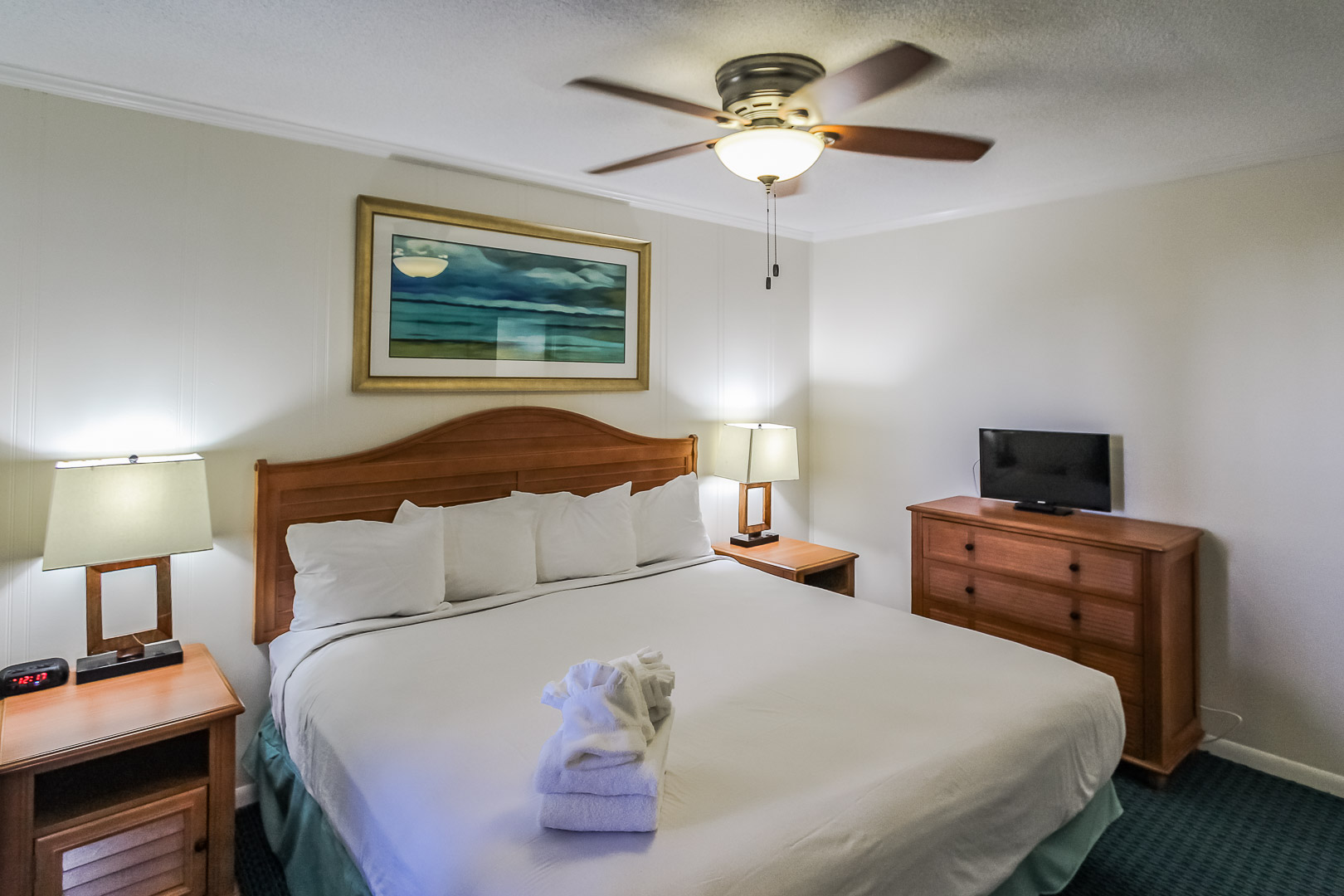 A quaint master bedroom at VRI's A Place at the Beach III in North Carolina